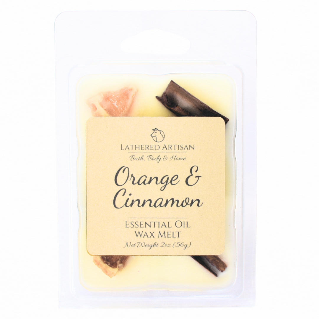 Ceras derretidas con aceites esenciales de naranja y canela